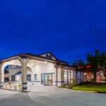 Night time exterior of SureStay Hotel by Best Western Jacksonville South